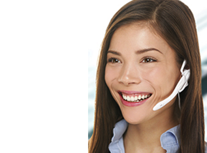 Smiling woman wearing telephone headset