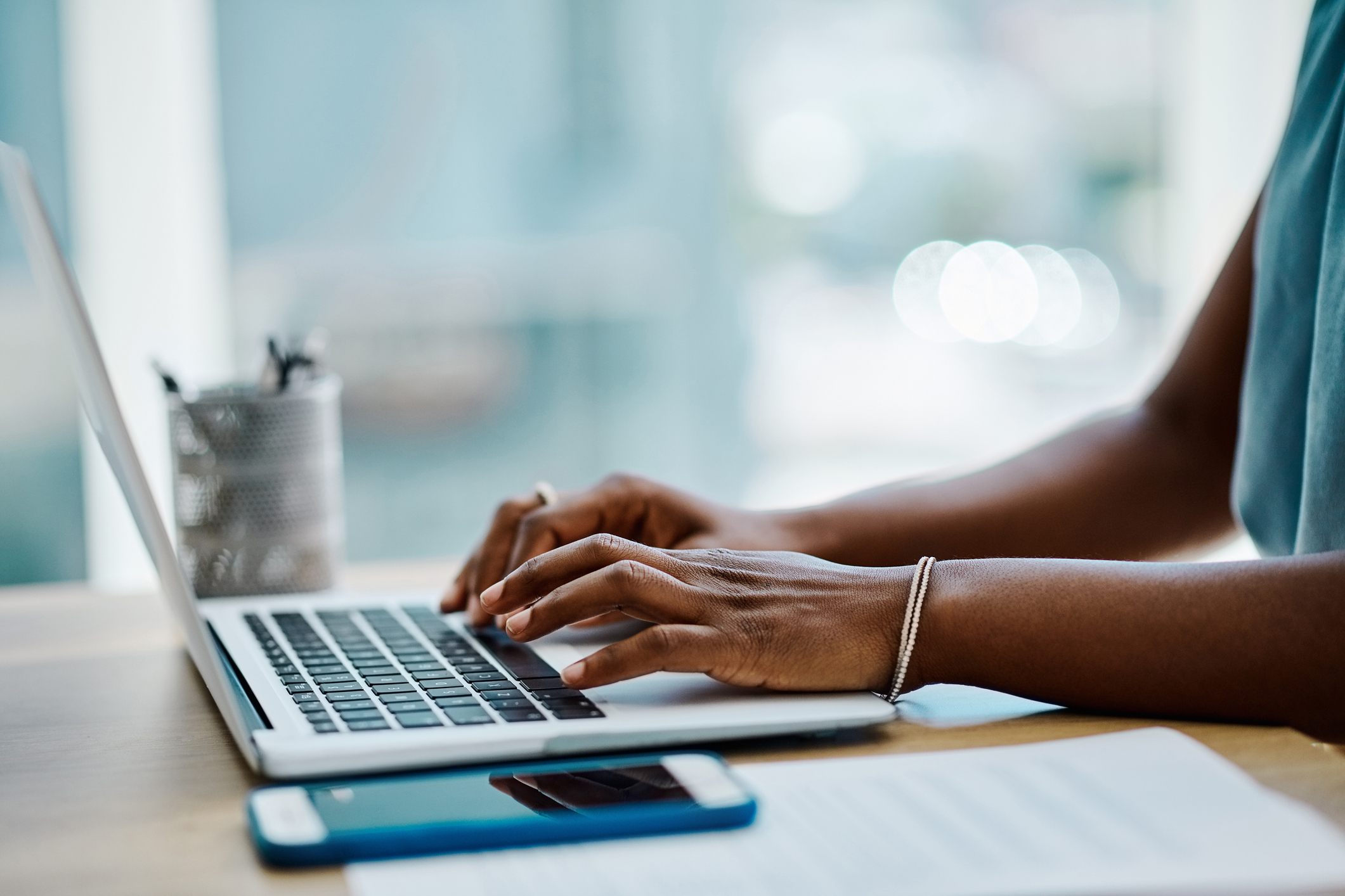 Woman Using Laptop Closeup