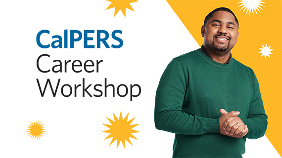 black man wearing green sweater, standing, smiling